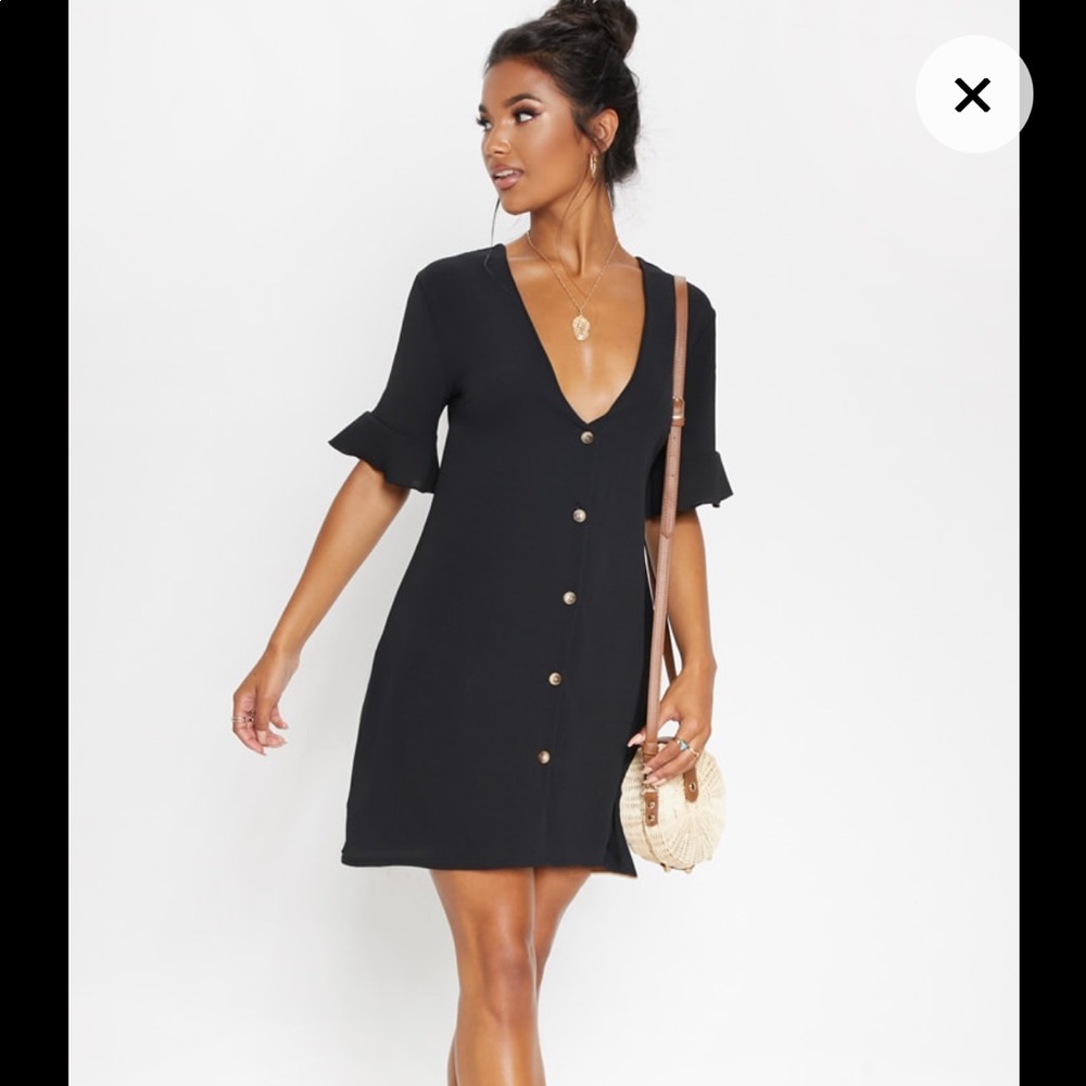Black button up dress with statement sleeves